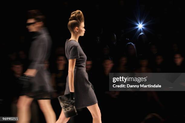 Model walks the runway at the Issa London show for London Fashion Week Autumn/Winter 2010 at Somerset House on February 23, 2010 in London, England.