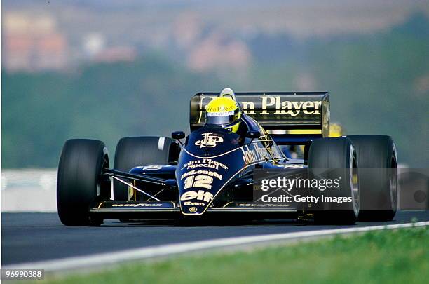 Ayrton Senna from Brazil drives the John Player Special Team Lotus-Renault 98T during the Hungarian Grand Prix on 10th August 1986 at the Hungaroring...