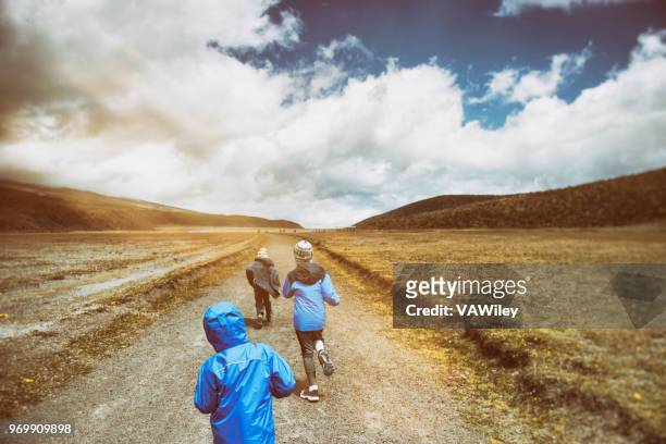 running wild and free in ecuador - ecuador family stock pictures, royalty-free photos & images