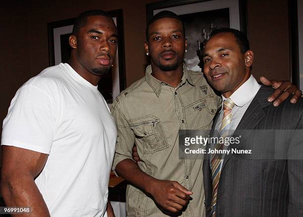 Vernon Miller, Kerry Rhodes, and Dr. Marvell Scott attend the Kerry Rhodes Foundation celebrity bowling at Lucky Strike on November 2, 2009 in New...