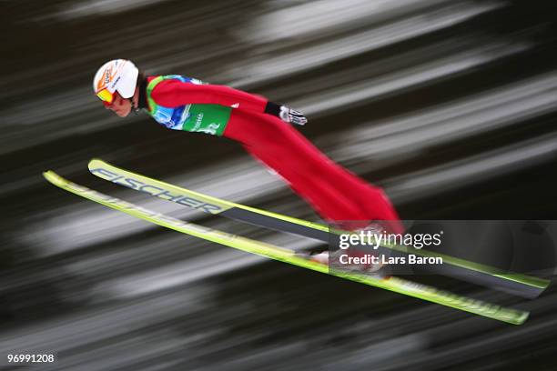 Johannes Rydzek of Germany jumps during the nordic combined on day twelve of the 2010 Vancouver Winter Olympics at Whistler Olympic Park Ski Jumping...