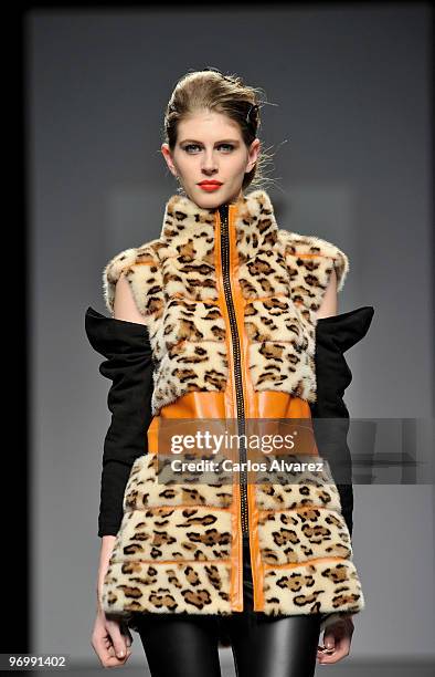 Model walks down the runway at Jesus Lorenzo show during Cibeles Madrid Fashion Week Autumn/Winter 2010 on February 23, 2010 in Madrid, Spain.