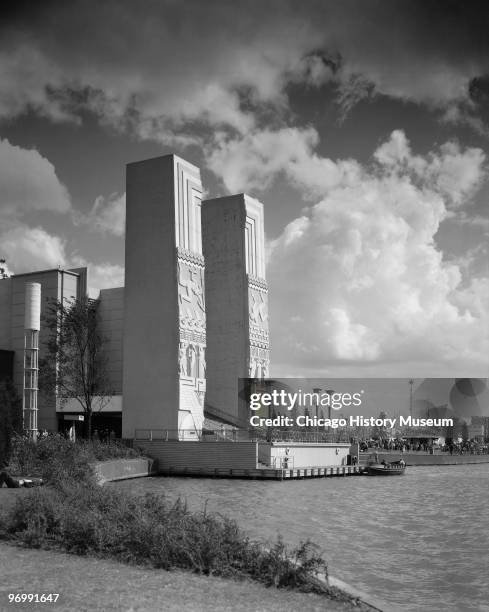 View of the Watergate entrance to the Electrical Building , which highlights two enormous pylons , at the Century of Progress International...