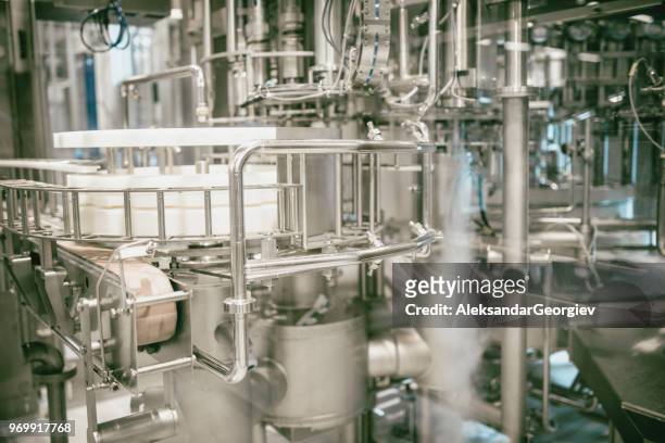 automated equipment for water distillation and bottling - fog machine stock pictures, royalty-free photos & images
