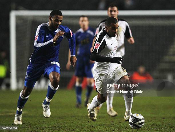 Jermaine Easter of MK Dons runs off Liam Trotter of Millwall during the Coca-Cola Football League One match between MK Dons and Millwall at Stadium...