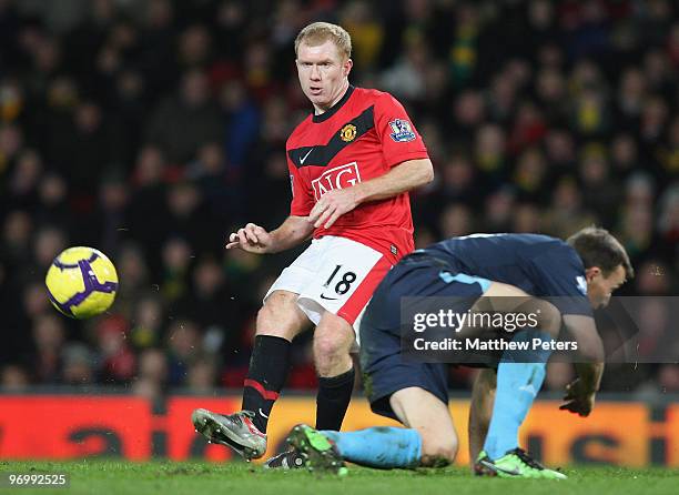 Paul Scholes of Manchester United clashes with Mark Noble of West Ham United during the FA Barclays Premier League match between Manchester United...