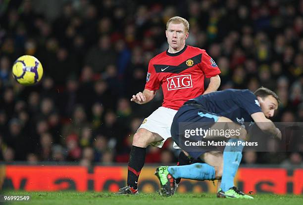 Paul Scholes of Manchester United clashes with Mark Noble of West Ham United during the FA Barclays Premier League match between Manchester United...