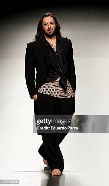 Dancer Rafael Amargo walks down the runway at the Lancia Charity show during Cibeles Madrid Fashion Week Autumn/Winter 2010 on February 23, 2010 in...