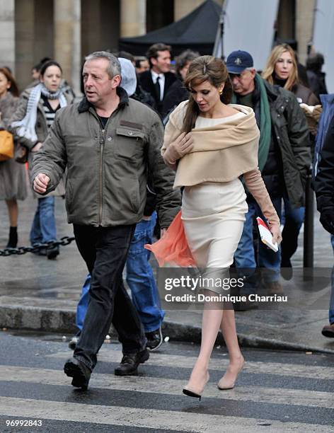 Actress Angelina Jolie films on location for "The Tourist" at Place Colette on February 23, 2010 in Paris, France.