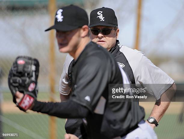 Pitching coach Don Cooper observes pitcher Jake Peavy of the Chicago White Sox during a workout on February 23, 2010 at the White Sox training...
