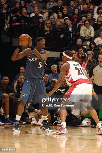 Josh Howard of the Washington Wizards handles the ball against Antoine Wright of the Toronto Raptors during the game on February 20, 2010 at Air...
