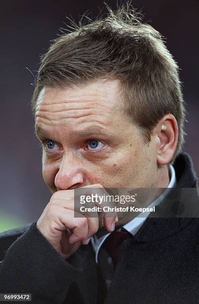 Manager Horst Heldt of Stuttgart looks on during the UEFA Champions League round of sixteen, first leg match between VfB Stuttgart and FC Barcelona...