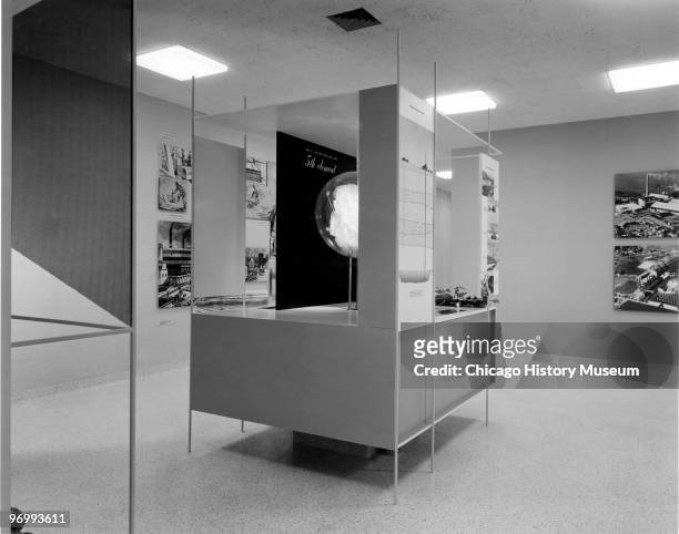 Interior view of the corporate headquarters of the Morton Salt Company, located at 110 North Wacker Drive, Chicago, 1958. The view shows a display of...