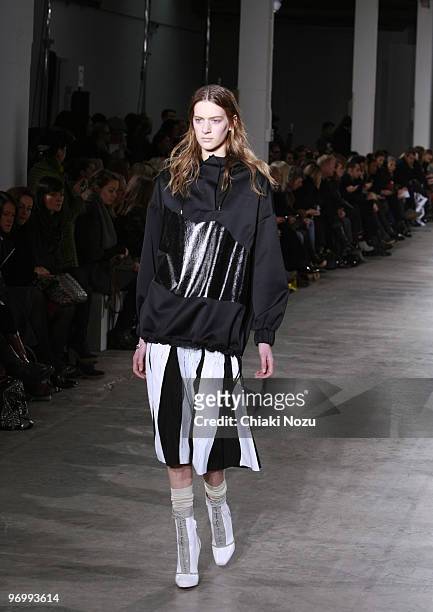 Model walks the runway during the Jonathan Saunders show for London Fashion Week Autumn/Winter 2010 at Old Truman Brewery on February 23, 2010 in...