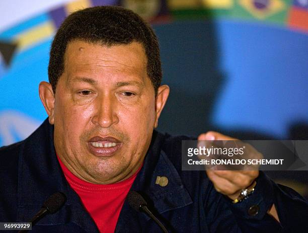Venezuelan President Hugo Chavez gestures as he delivers a press conference after the closing of the Rio Group summit and the Caribbean Community...
