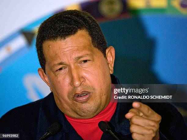 Venezuelan President Hugo Chavez gestures as he delivers a press conference after the closing of the Rio Group summit and the Caribbean Community...