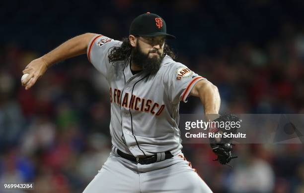 Cory Gearrin of the San Francisco Giants in action against the Philadelphia Phillies during a game at Citizens Bank Park on May 8, 2018 in...