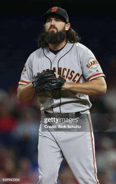 Cory Gearrin of the San Francisco Giants in action against the Philadelphia Phillies during a game at Citizens Bank Park on May 8, 2018 in...