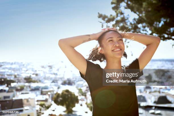 woman smiling workout training and running, detemination, vitality. - san francisco marathon stock pictures, royalty-free photos & images