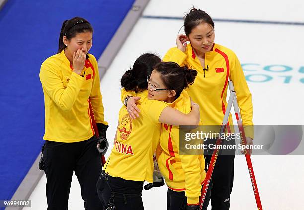 China skip Bingyu Wang celebrates with team mates after the women's curling round robin game between China and the United States on day 12 of the...