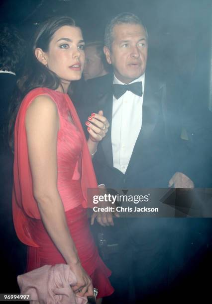 Charlotte Casiraghi and Mario Testino are seen before smoke alarms go off as they attend the Love Ball London at the Roundhouse on February 23, 2010...