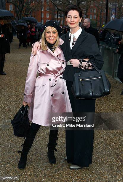 Twiggy and Erin O'Conner arrive for the Burberry Prorsum show at London Fashion Week Autumn/Winter 2010>> at on February 23, 2010 in London, England.