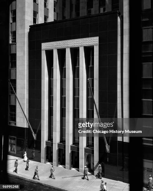 Exterior view of the Field Building, an office building at 135 South LaSalle Street, showing the main entrance, Chicago, IL, 1932. The landmark...