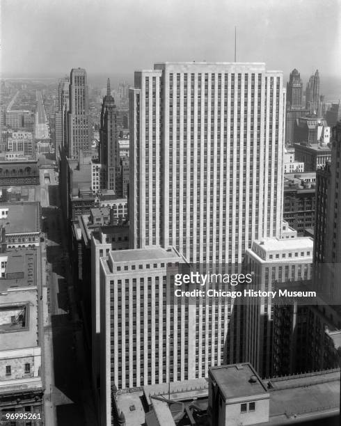 Exterior elevation view of the Field Building, an office building at 135 South LaSalle Street, showing it with surrounding structures, Chicago, IL,...