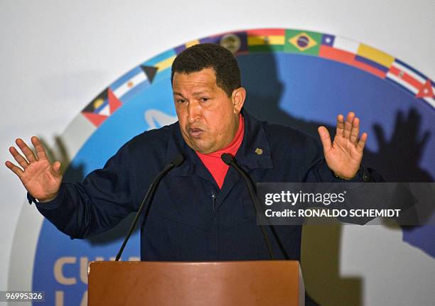 Venezuelan President Hugo Chavez gestures as he delivers a press conference after the closing of the Rio Group summit and the Caribbean Community...