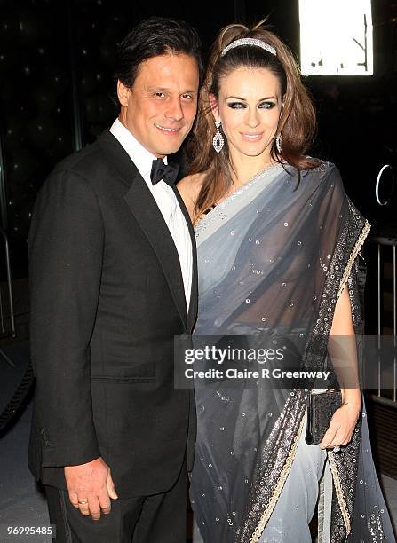 Elizabeth Hurley and Arun Nayar arrive at the Love Ball at The Roundhouse on February 23, 2010 in London, England.