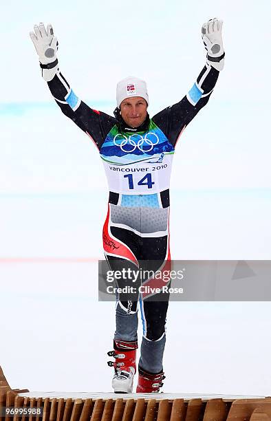 Bronze medalist Aksel Lund Svindal of Norway celebrates after his performance the Alpine Skiing Men's Giant Slalom on day 12 of the Vancouver 2010...