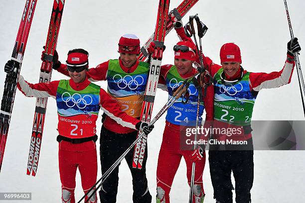 Team USA Brett Camerota, Johnny Spillane, Bill Demong, and Todd Lodwick celebrate after winning Olympic Silver in the Nordic Combined on day twelve...