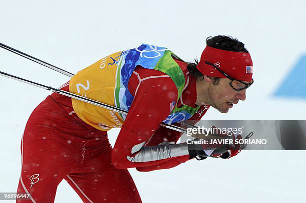 Johnny Spillane of the US competes in his leg of the men's Nordic Combined team 4x5 km at the Whistler Olympic Park during the Vancouver Winter...