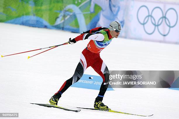 Austria's Bernhard Gruber competes in the men's Nordic Combined team 4x5 km at the Whistler Olympic Park during the Vancouver Winter Olympics on...