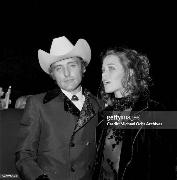 Actor and director Dennis Hopper and actress and singer Michelle Phillips attend the Governor's Ball after the 42nd Acadamy Awards on April 7, 1970...