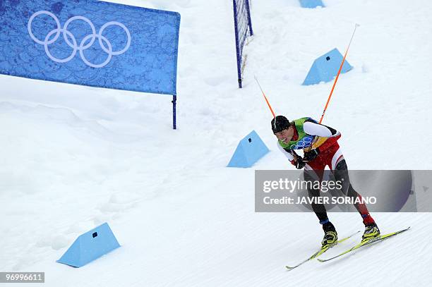 Austria's Felix Gottwald competes in the men's Nordic Combined team 4x5 km at the Whistler Olympic Park during the Vancouver Winter Olympics on...