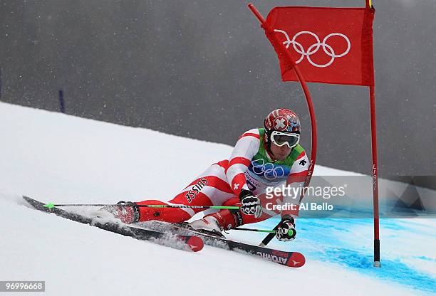 Gold medalist Carlo Janka of Switzerland competes during the Alpine Skiing Men's Giant Slalom on day 12 of the Vancouver 2010 Winter Olympics at...