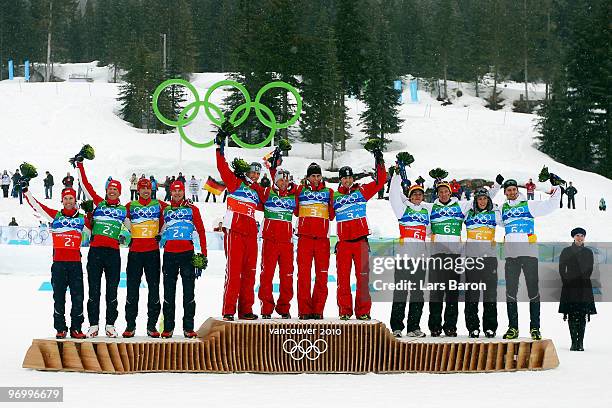 Team Austria celebrates their Olympic Gold, Team USA their Silver and Team Germany their Bronze in the Nordic Combined on day twelve of the 2010...