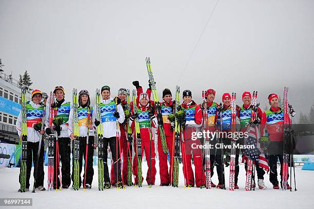 Team Austria celebrates their Olympic Gold, Team USA their Silver and Team Germany their Bronze in the Nordic Combined on day twelve of the 2010...