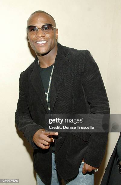 Boxer Floyd Mayweather Jr poses for photos at Gavin Maloof's housewarming party at his private residence on October 25, 2007 in Las Vegas, Nevada.