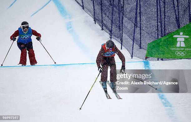 Ashleigh McIvor of Canada takes 1st place, Hedda Berntsen of Norway takes 2nd place during the Women's Freestyle Skiing Ski Cross on Day 12 of the...