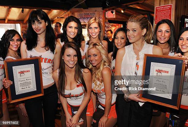 DreamWorks Pictures "She's Out Of My League" co-stars, Krysten Ritter and Alice Eve become "Honorary Hooters Girls" at Hooters on February 23, 2010...