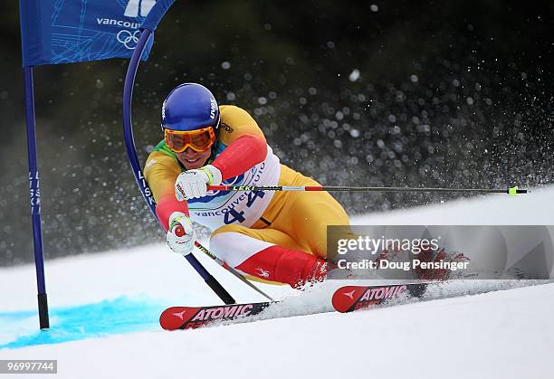 Erik Guay of Canada competes during the Alpine Skiing Men's Giant Slalom on day 12 of the Vancouver 2010 Winter Olympics at Whistler Creekside on...