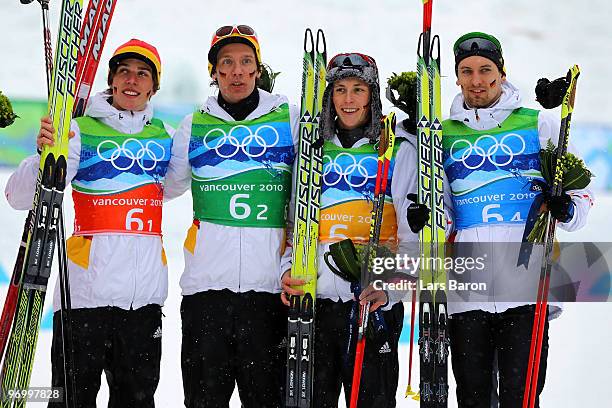 Team Germany Johannes Rydzek, Tino Edelmann, Eric Frenzel, and Bjoern Kircheisen celebrate after winning Olympic Bronze ini the nordic combined on...