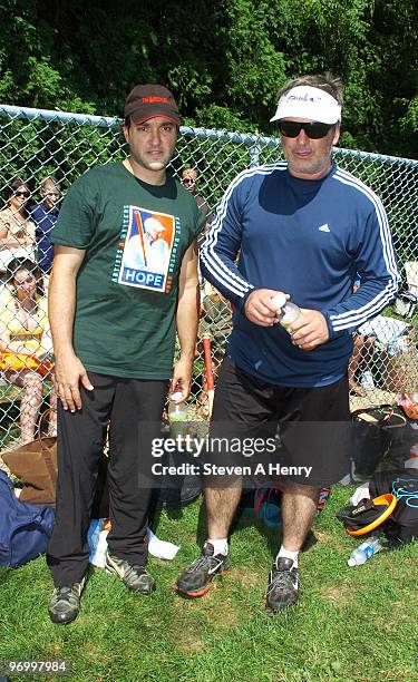 Actors Greg Bello and Alec Baldwin attend the 61st Annual Artist vs. Writers Charity softball game at Herrick Park on August 15, 2009 in East...
