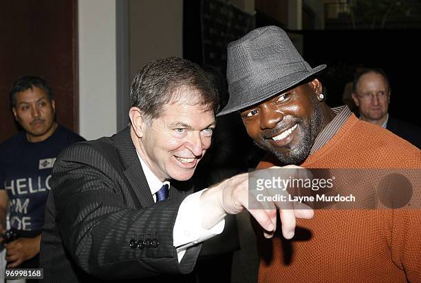 JCPenney CEO Mike Ullman and former Dallas Cowboy Emmitt Smith attend the JOE Joseph Abboud Cocktail Party at JCPenney on September 14, 2009 in...