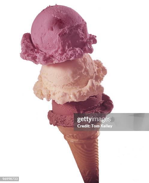 Flavor ice cream cone with chocolate, vanilla and strawberry in circa 1953.