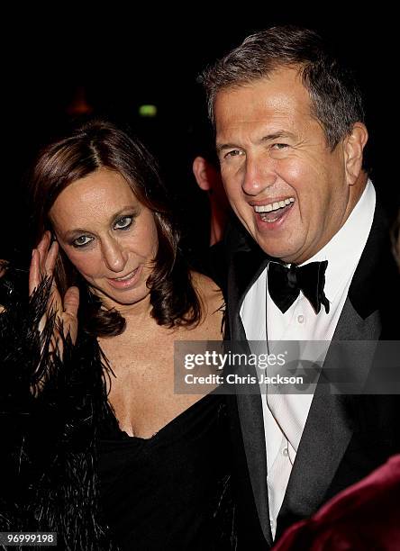 Mario Testino and Donna Karen attend the Love Ball London at the Roundhouse on February 23, 2010 in London, England. The event was hosted by Russian...