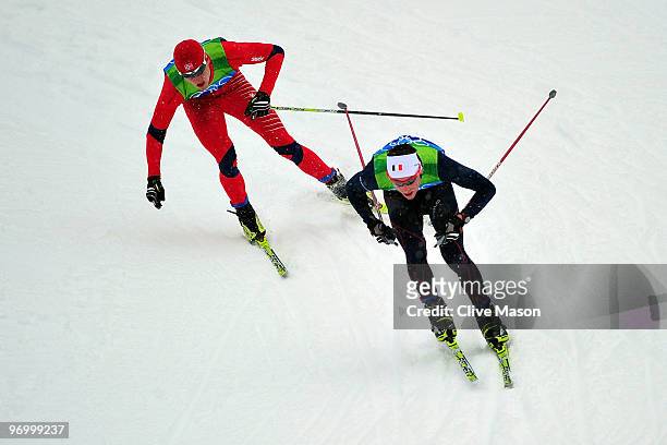 Francois Braud of France and Espen Rian of Norway during their portion of the Nordic Combined Team relay on day twelve of the 2010 Vancouver Winter...