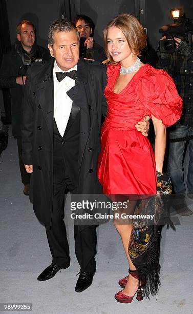 Natalia Vodianova and Mario Testino arrive at the Love Ball at The Roundhouse on February 23, 2010 in London, England.